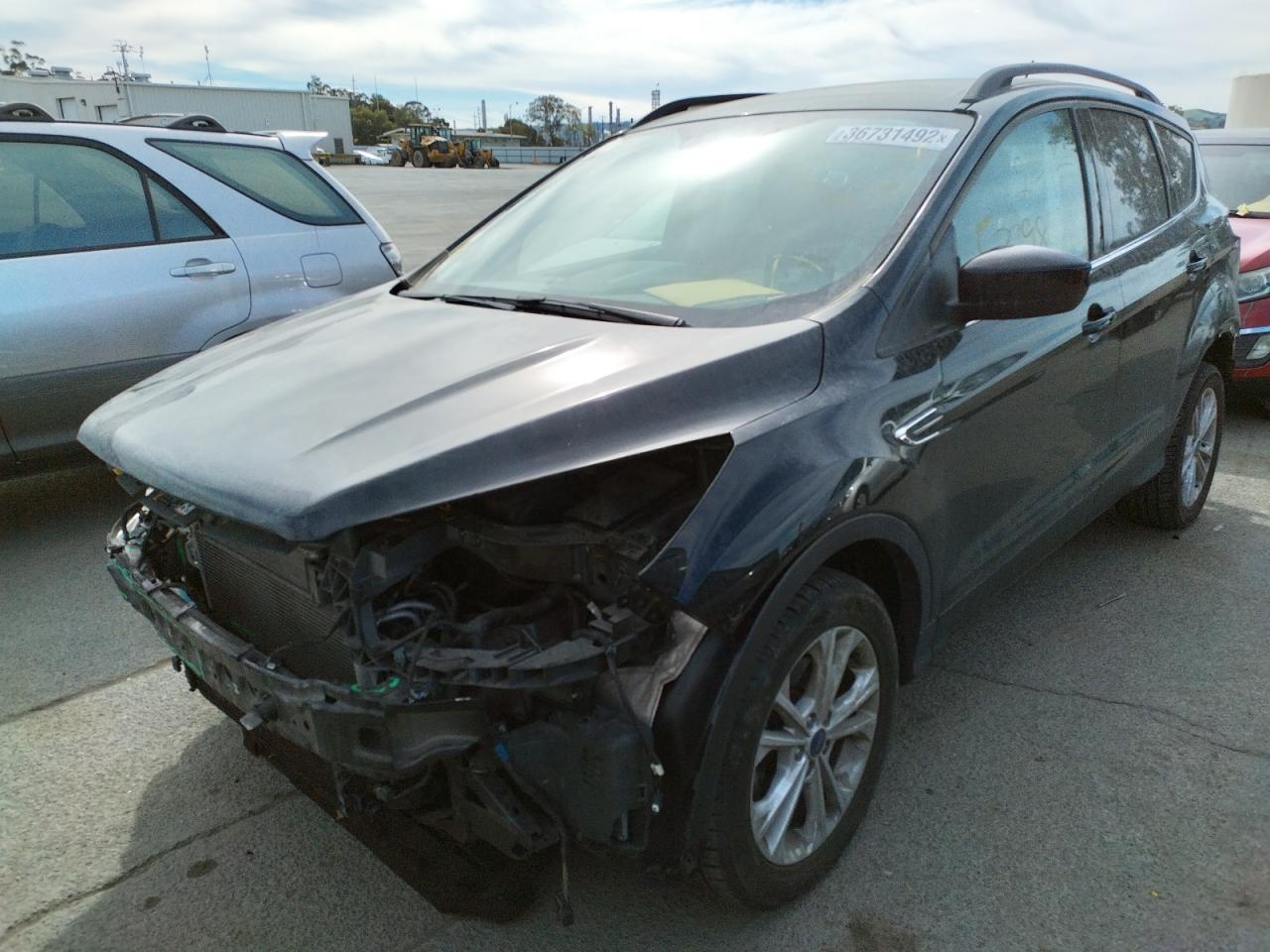 Photo 2 from auction – 2018 FORD ESCAPE SEL with VIN 1FMCU0HD6JUA62615