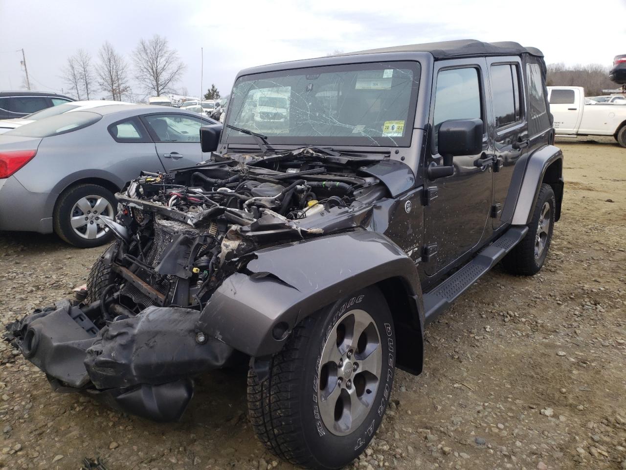 Foto 2 de la subasta – 2016 JEEP WRANGLER U con VIN 1C4BJWEG9GL180943