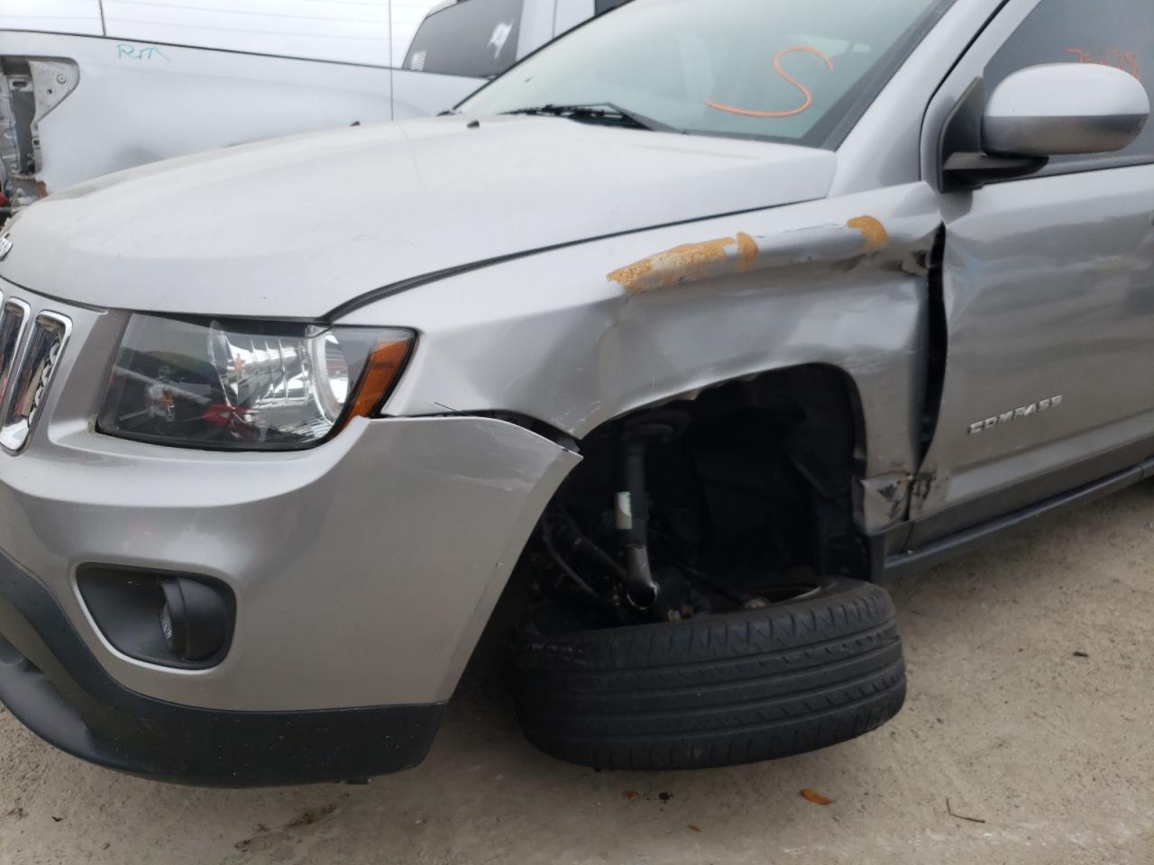 Photo 9 from auction – 2014 JEEP COMPASS LA with VIN 1C4NJDEBXED858886