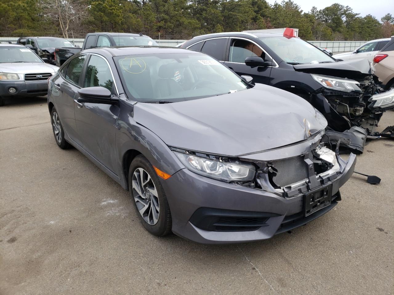 HONDA CIVIC EX 2018 with VIN 2HGFC2F72JH600096 - Photo from auction