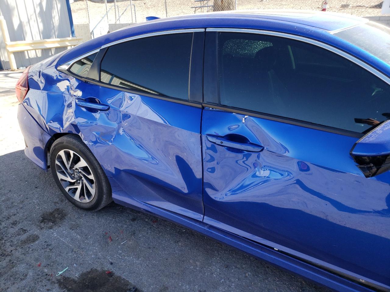 Photo 9 from auction – 2018 HONDA CIVIC EX with VIN 19XFC2F79JE020256