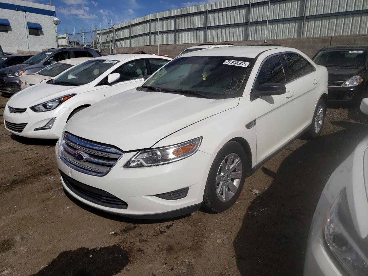 Photo 2 from auction – 2011 FORD TAURUS SE with VIN 1FAHP2DW1BG123959