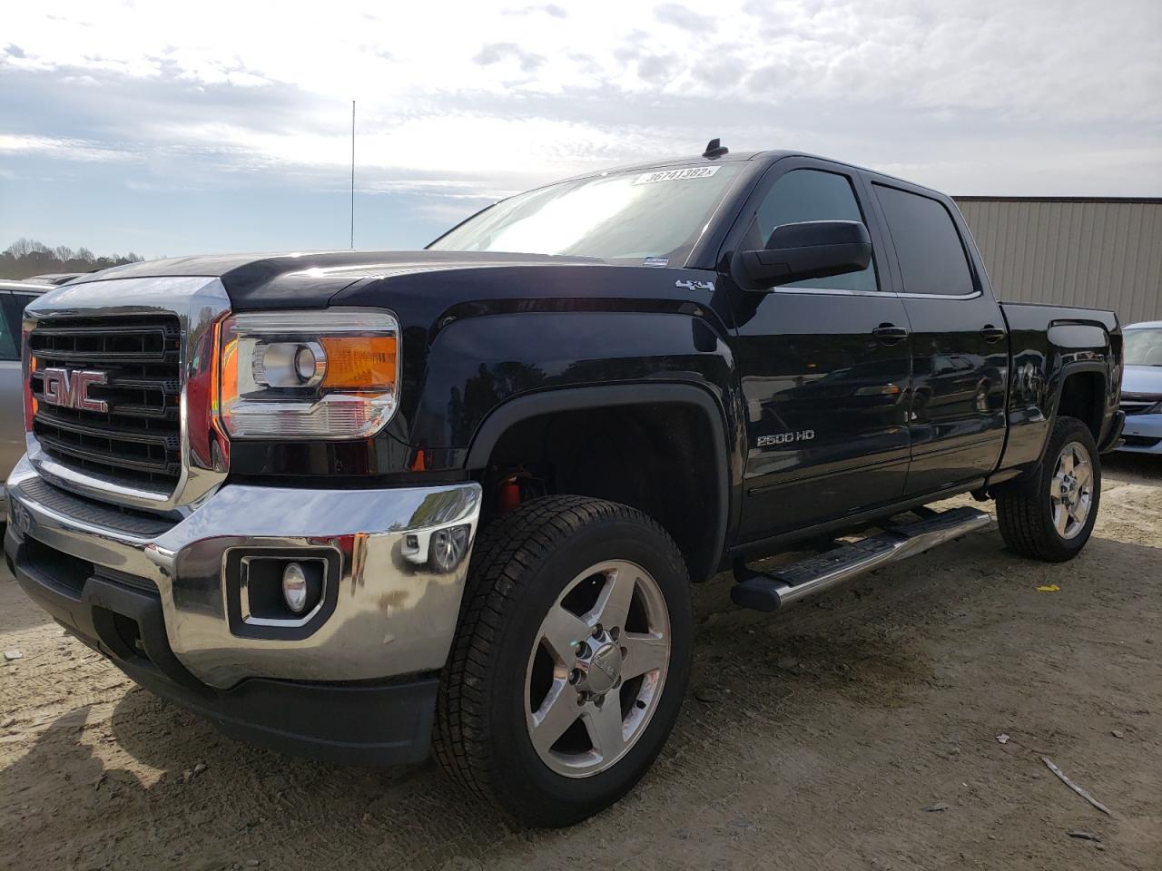 Photo 2 from auction – 2015 GMC SIERRA K25 with VIN 1GT12YEG0FF160307
