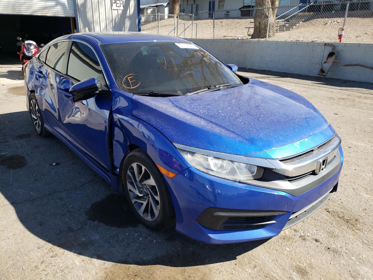 HONDA CIVIC EX 2018 with VIN 19XFC2F79JE020256 - Photo from auction