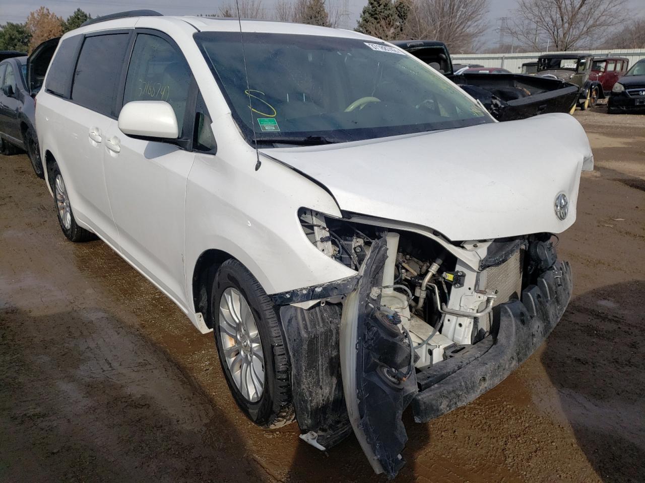 TOYOTA SIENNA XLE 2011 with VIN 5TDYK3DCXBS026687 - Photo from auction