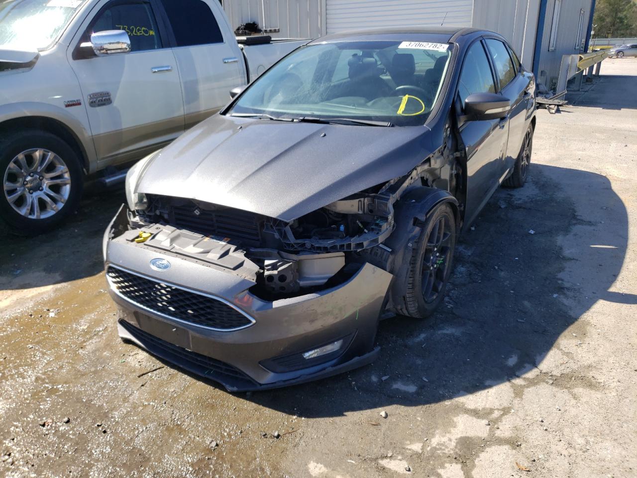 Photo 2 from auction – 2016 FORD FOCUS SE with VIN 1FADP3F24GL356649