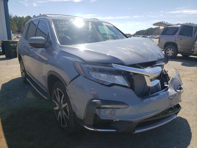 Photo 1 from auction – 2022 HONDA PILOT TOUR with VIN 5FNYF5H61NB014473