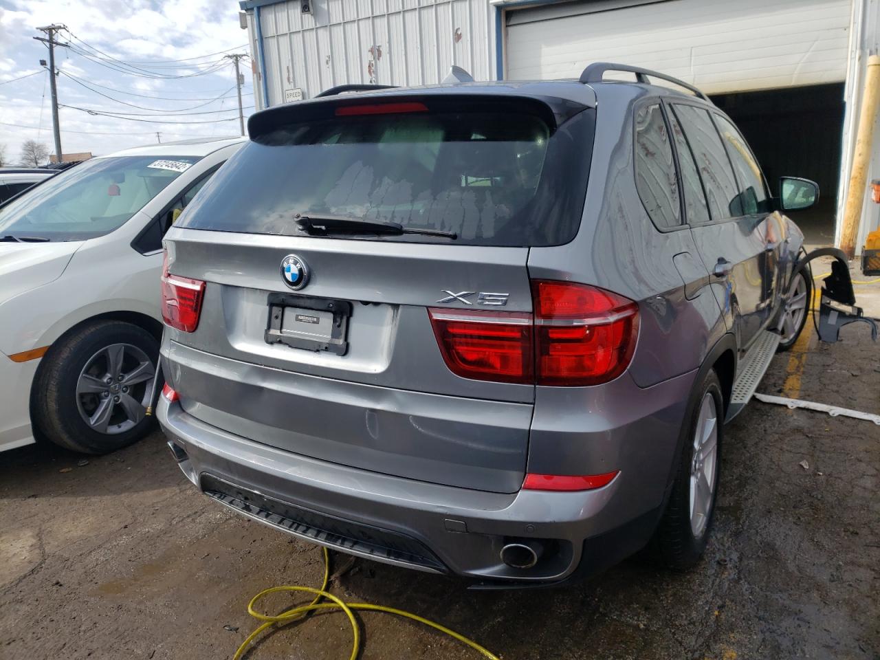 Photo 4 from auction – 2012 BMW X5 XDRIVE3 with VIN 5UXZW0C50CL673028
