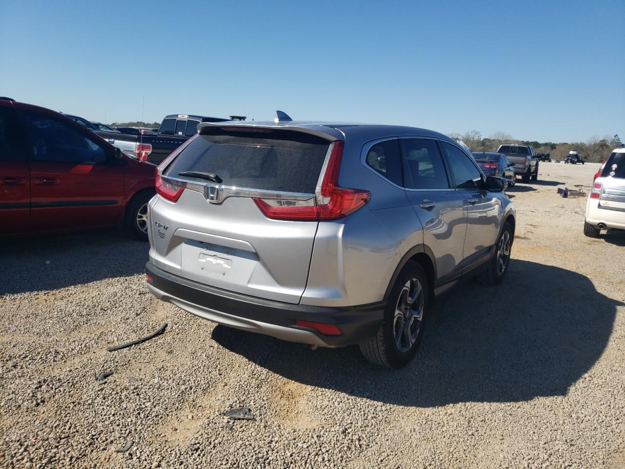 Photo 4 from auction – 2017 HONDA CR-V EX with VIN 7FARW1H56HE047210