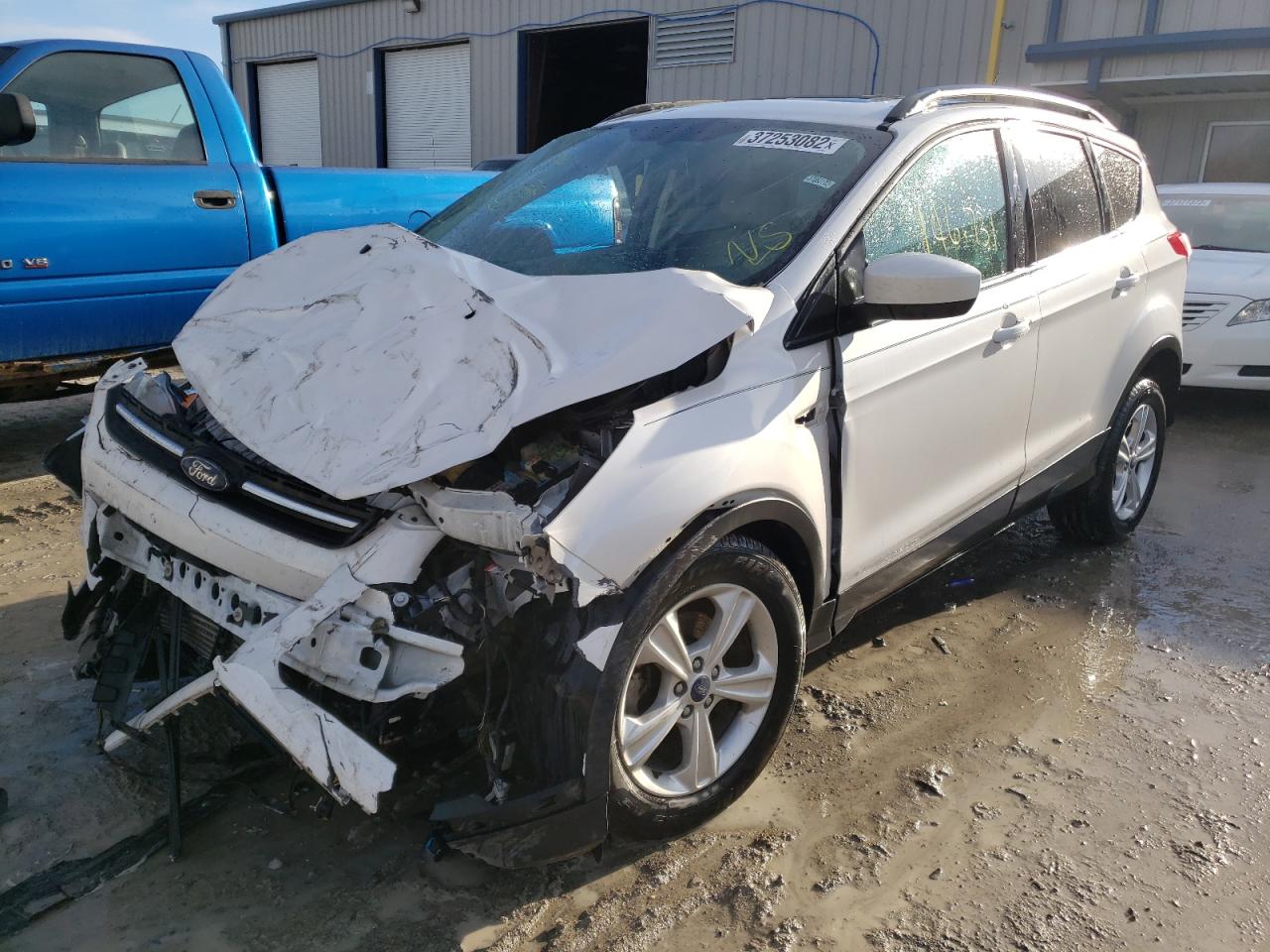 Photo 2 from auction – 2014 FORD ESCAPE SE with VIN 1FMCU0GX2EUB25128