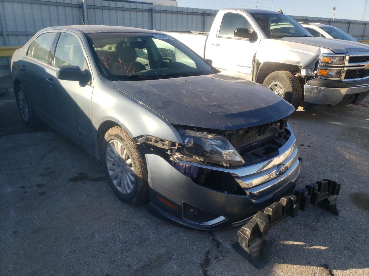 FORD FUSION HYB 2011 with VIN 3FADP0L39BR335561 - Photo from auction