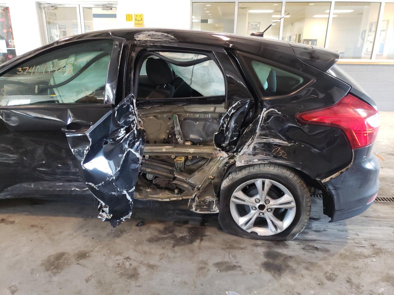 Photo 9 from auction – 2014 FORD FOCUS SE with VIN 1FADP3K27EL266320