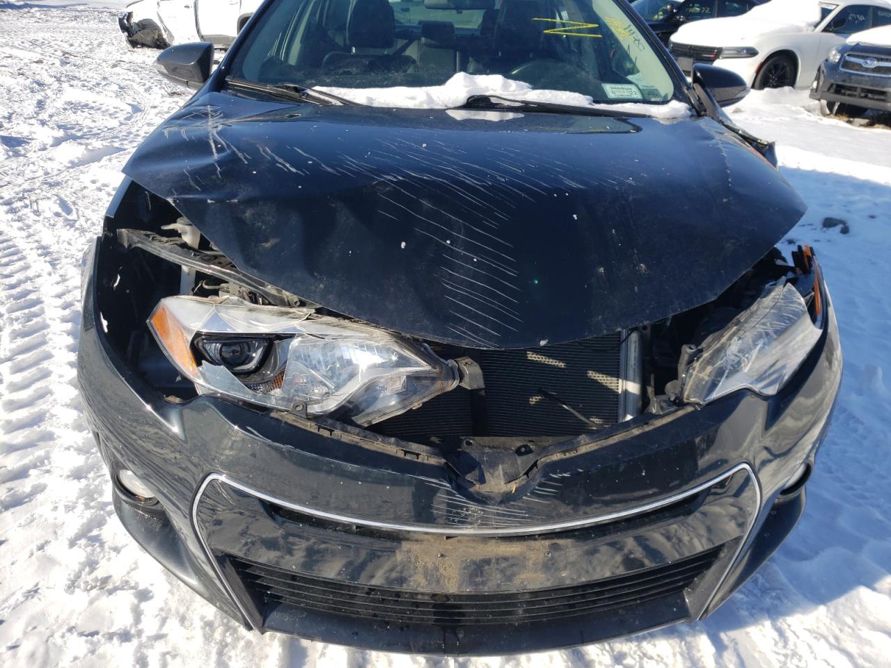 Photo 19 from auction – 2014 TOYOTA COROLLA L with VIN 2T1BURHE4EC076593