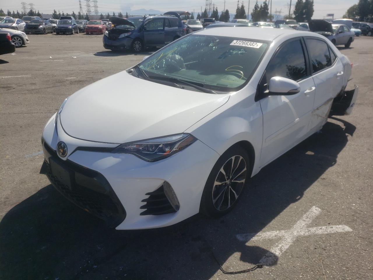 Photo 2 from auction – 2019 TOYOTA COROLLA L with VIN 5YFBURHE3KP899799