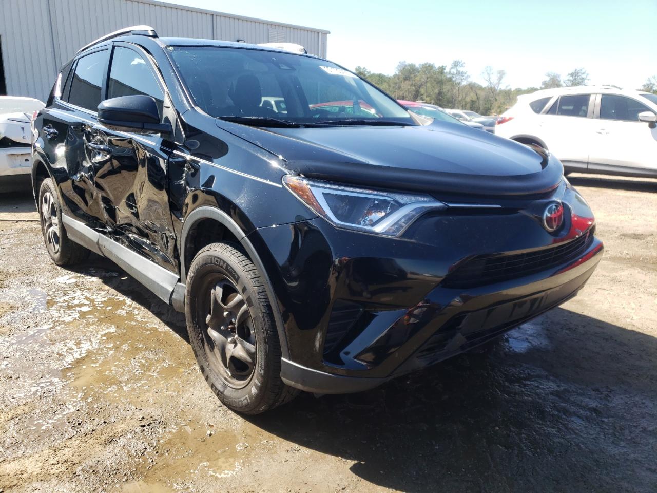 TOYOTA RAV4 LE 2018 with VIN 2T3ZFREV1JW499290 - Photo from auction
