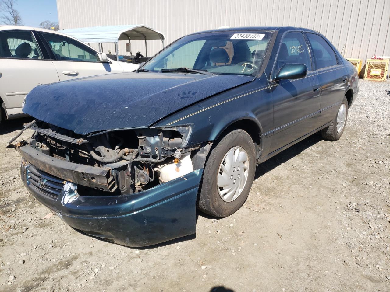 Photo 2 from auction – 1997 TOYOTA CAMRY CE with VIN 4T1BG22K2VU062560