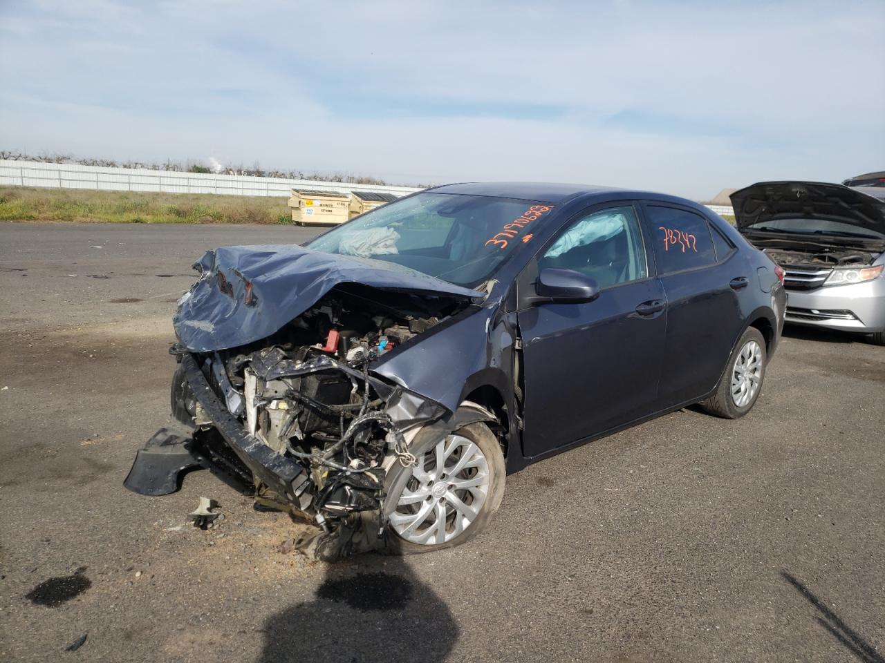 Photo 2 from auction – 2018 TOYOTA COROLLA L with VIN 5YFBURHE0JP755481
