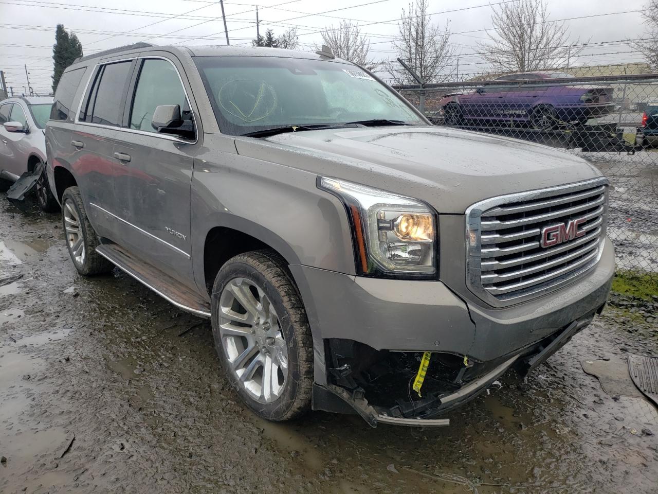 GMC YUKON SLT 2019 with VIN 1GKS2BKC2KR394643 - Photo from auction