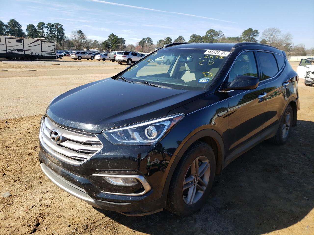 Photo 2 from auction – 2017 HYUNDAI SANTA FE S with VIN 5NMZU3LB7HH026858