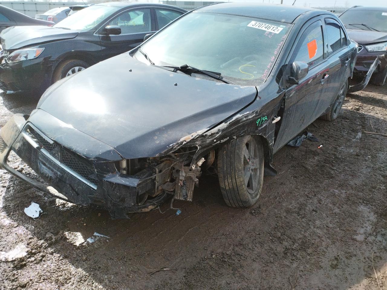 Photo 2 from auction – 2014 MITSUBISHI LANCER SE with VIN JA32V2FW4EU015231