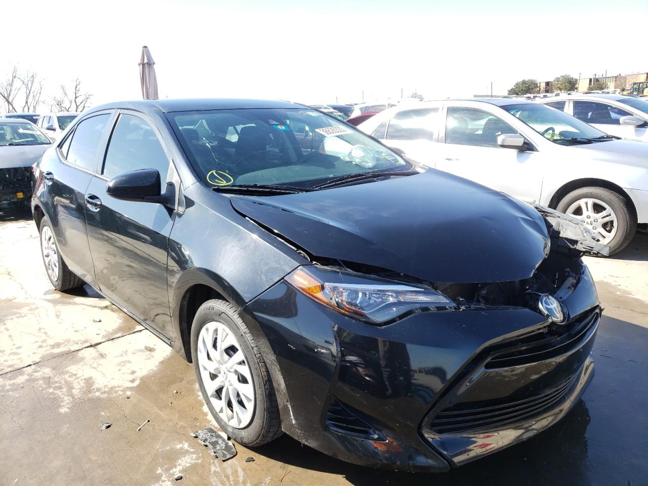 TOYOTA COROLLA L 2017 with VIN 5YFBURHE5HP710031 - Photo from auction
