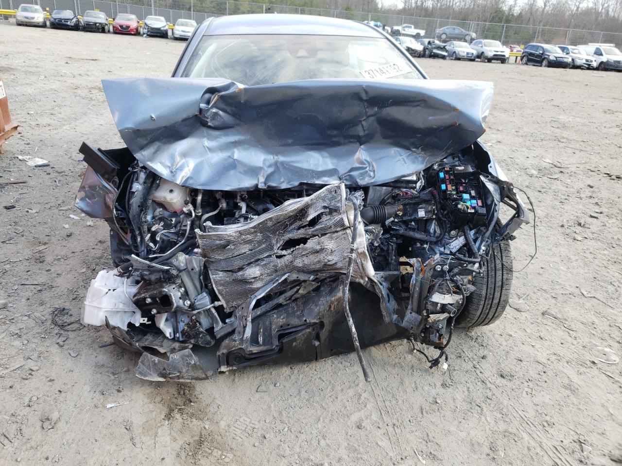Photo 9 from auction – 2021 TOYOTA COROLLA LE with VIN JTDEPMAE1MJ154784