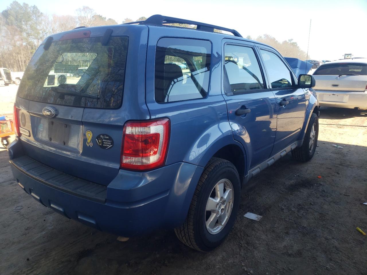 Photo 4 from auction – 2009 FORD ESCAPE XLS with VIN 1FMCU02749KB64697