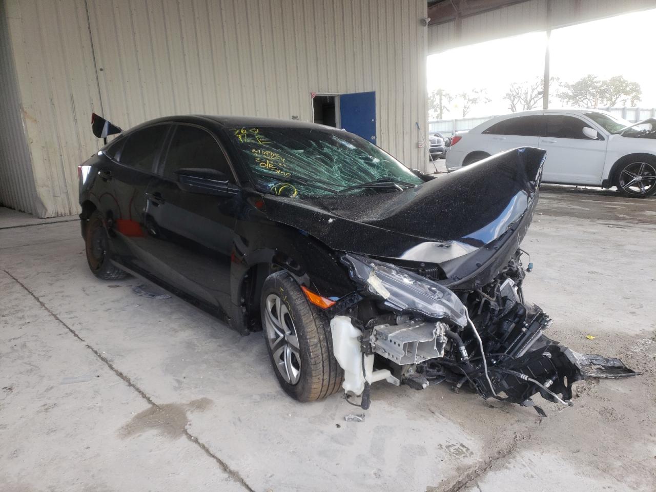 HONDA CIVIC LX 2017 with VIN 19XFC2F52HE057190 - Photo from auction