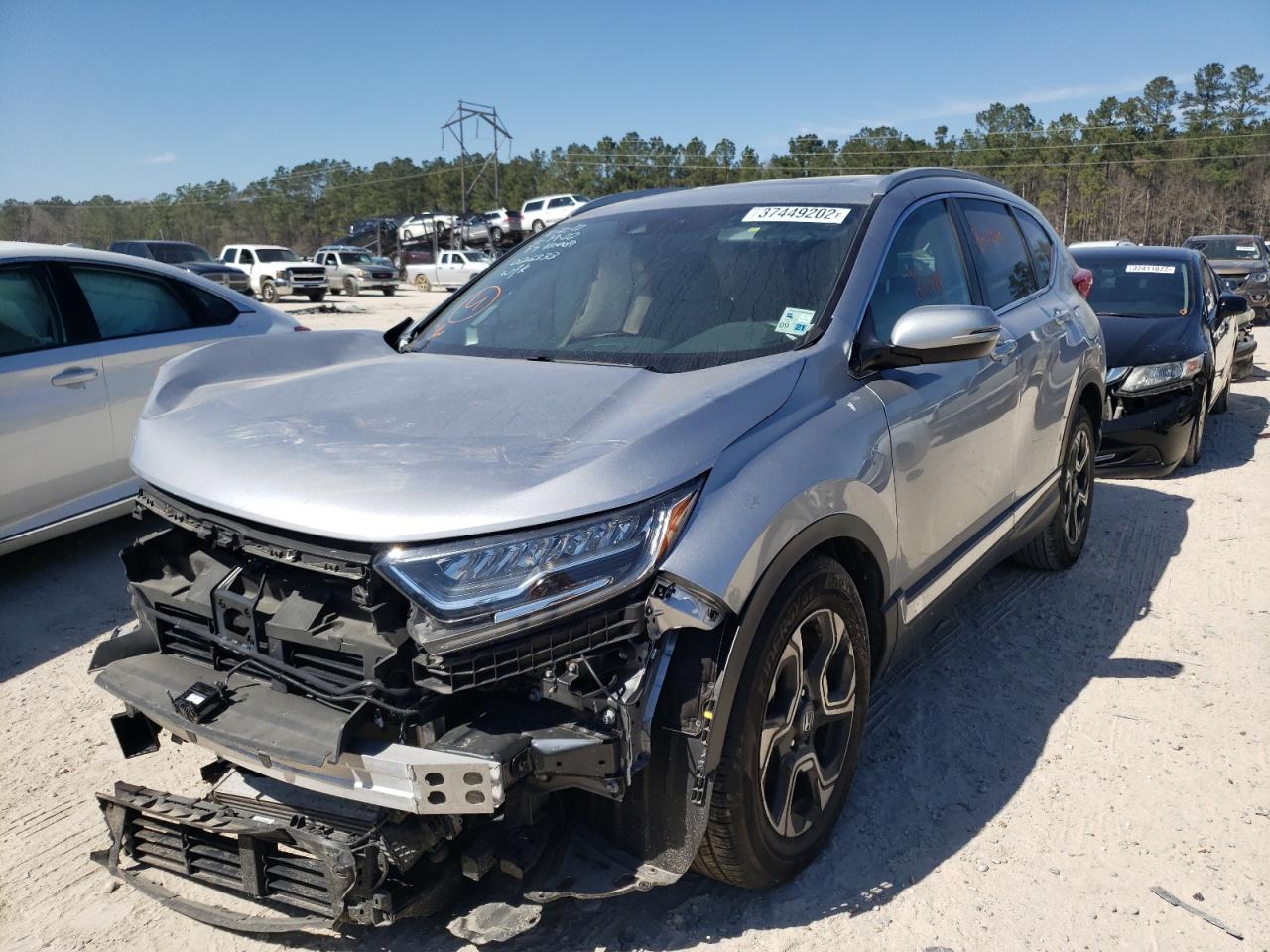 Photo 2 from auction – 2017 HONDA CR-V TOURI with VIN 7FARW1H91HE026333