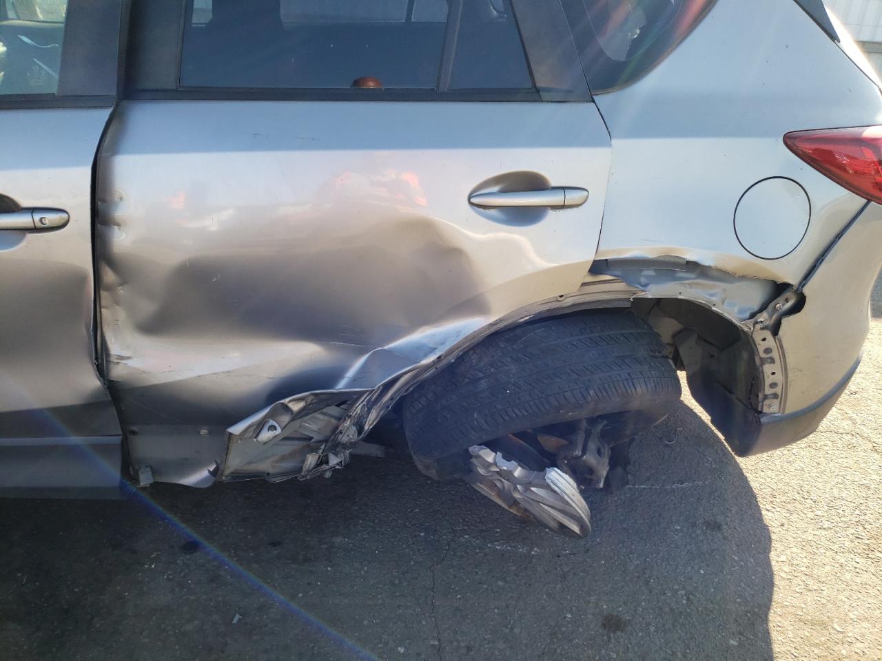 Photo 9 from auction – 2013 MAZDA CX-5 SPORT with VIN JM3KE2BE0D0143137