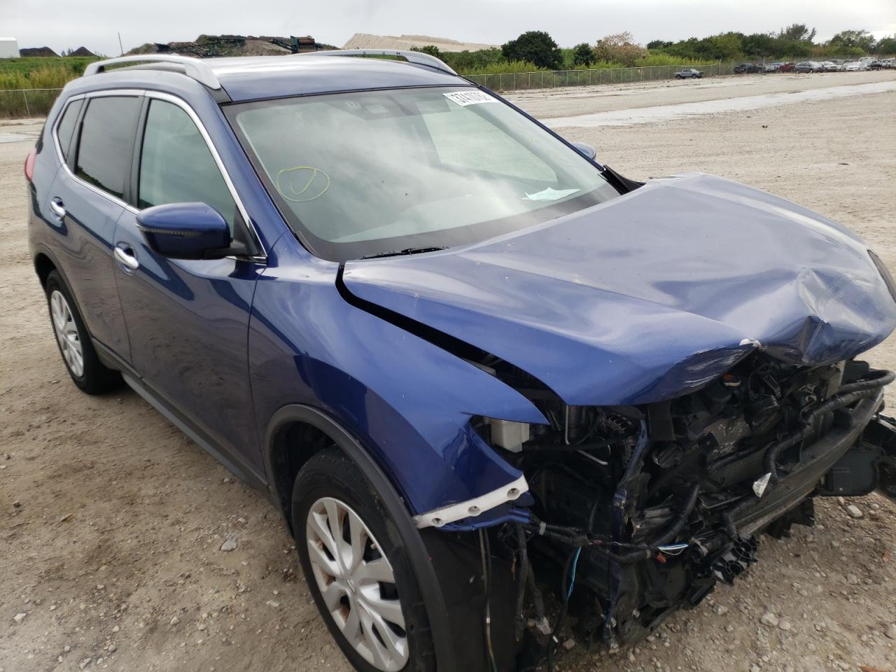 NISSAN ROGUE S 2017 with VIN 5N1AT2MT2HC840931 - Photo from auction