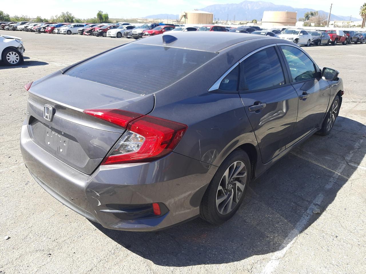 Photo 4 from auction – 2018 HONDA CIVIC EX with VIN 2HGFC2F70JH540710