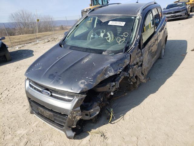 Photo 2 from auction – 2016 FORD ESCAPE TIT with VIN 1FMCU9JX1GUB55561