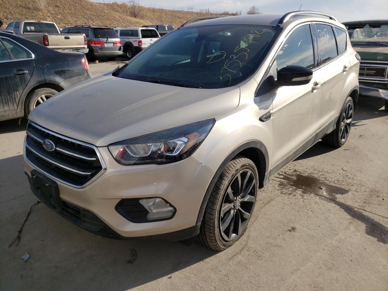 Photo 2 from auction – 2017 FORD ESCAPE TIT with VIN 1FMCU9J95HUB60541
