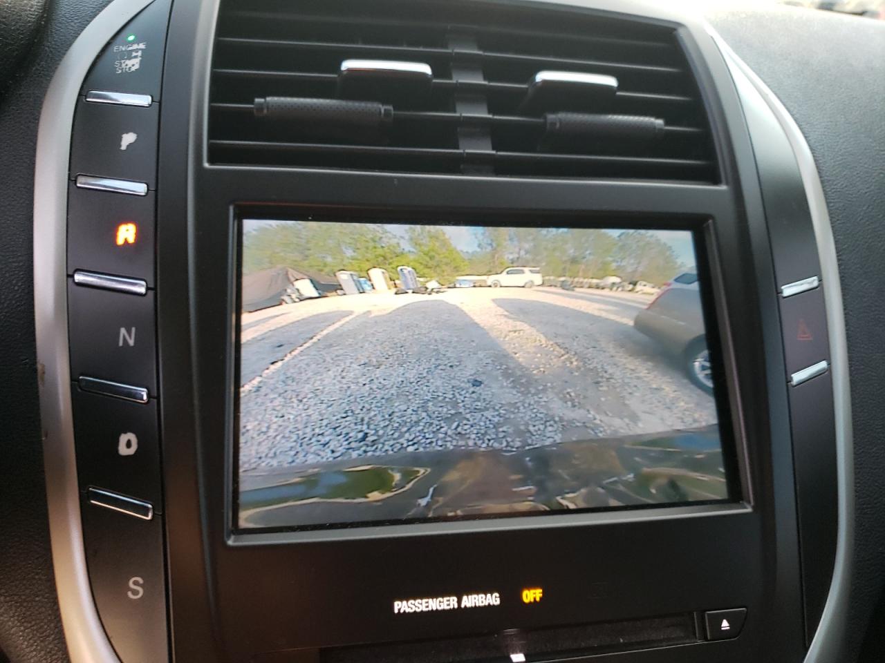 Photo 9 from auction – 2015 LINCOLN MKC with VIN 5LMCJ1A93FUJ07809