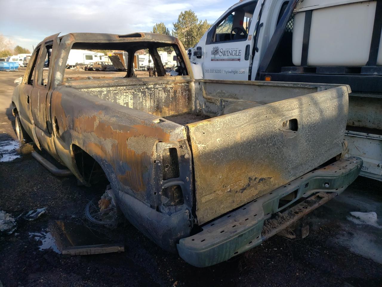 Photo 3 from auction – 2003 GMC SIERRA K25 with VIN 1GTHK29G83E265779