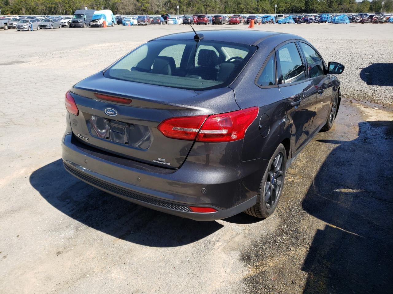 Photo 4 from auction – 2016 FORD FOCUS SE with VIN 1FADP3F24GL356649