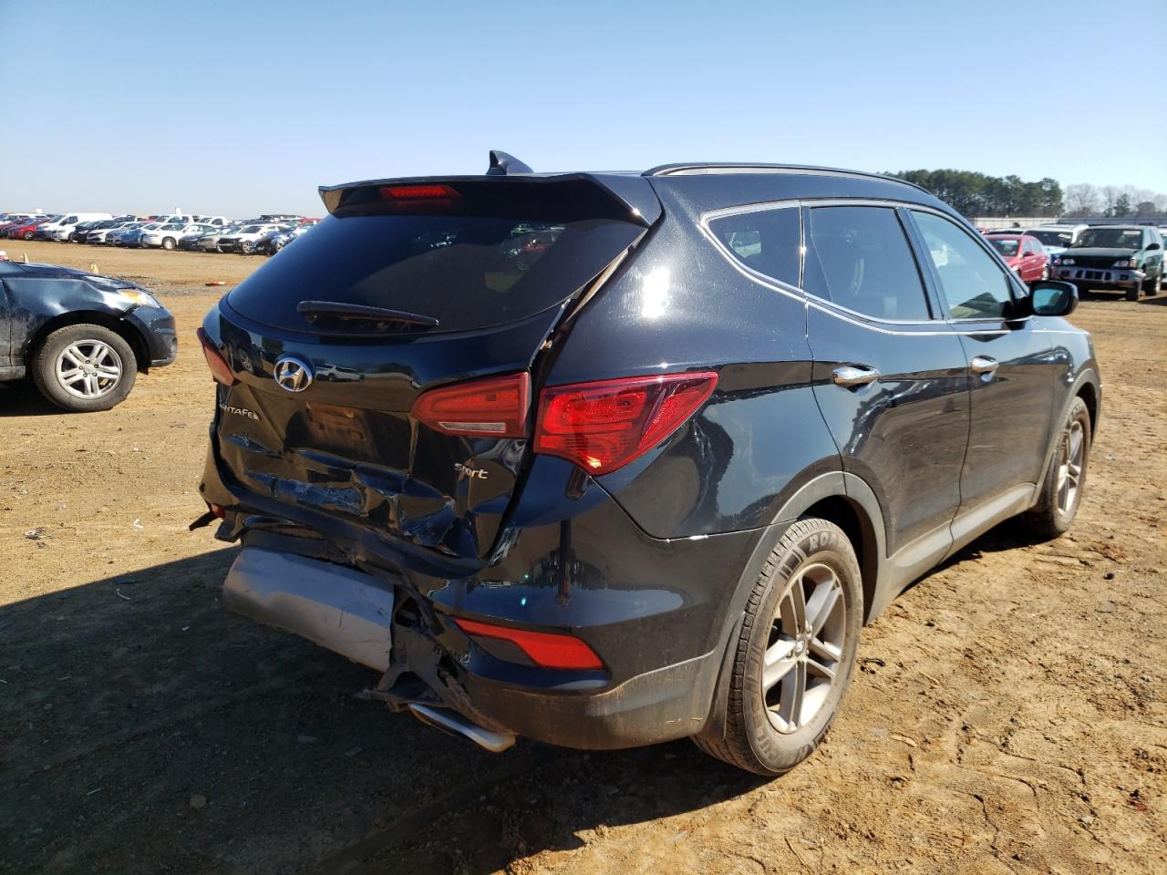 Photo 4 from auction – 2017 HYUNDAI SANTA FE S with VIN 5NMZU3LB7HH026858