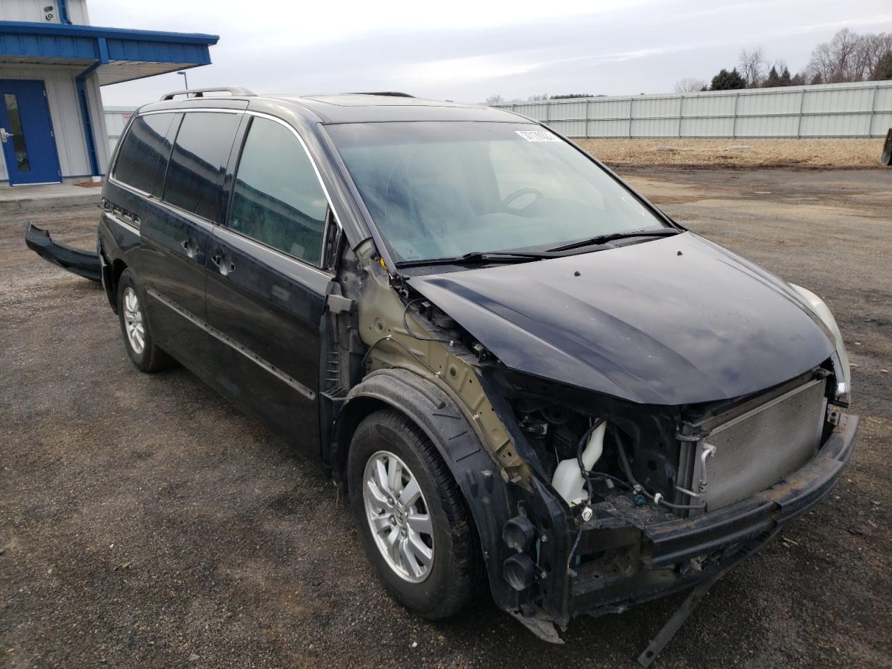 HONDA ODYSSEY EX 2010 with VIN 5FNRL3H77AB087450 - Photo from auction