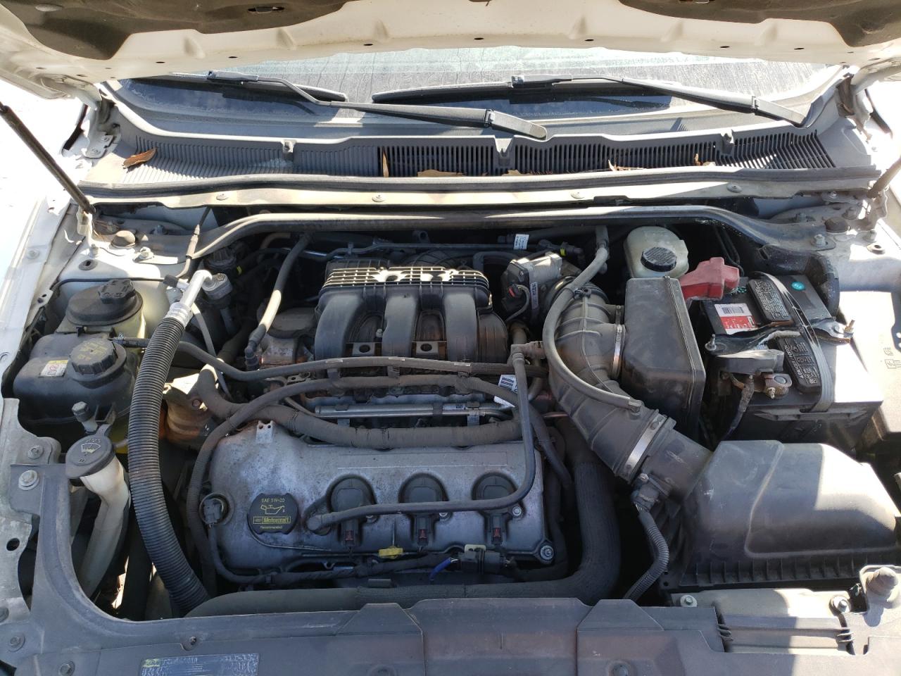 Photo 7 from auction – 2011 FORD TAURUS LIM with VIN 1FAHP2FW9BG114570