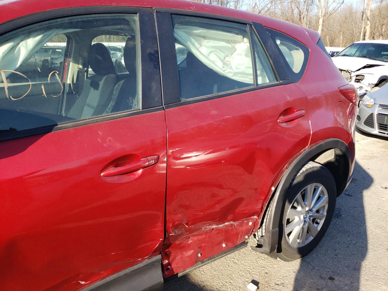 Photo 9 from auction – 2014 MAZDA CX-5 SPORT with VIN JM3KE2BE9E0408123