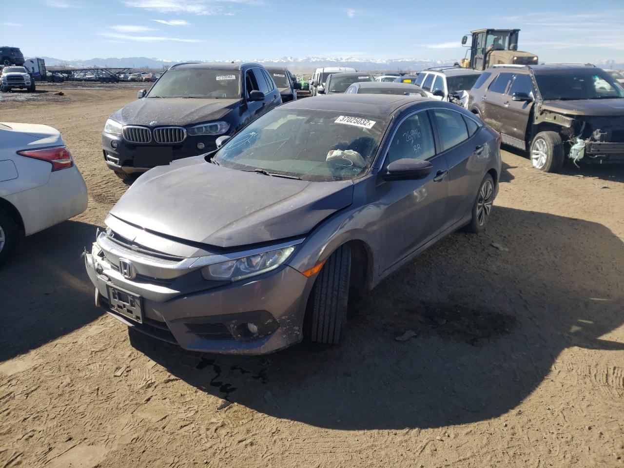 Photo 2 from auction – 2018 HONDA CIVIC with VIN JHMFC1F74JX026412