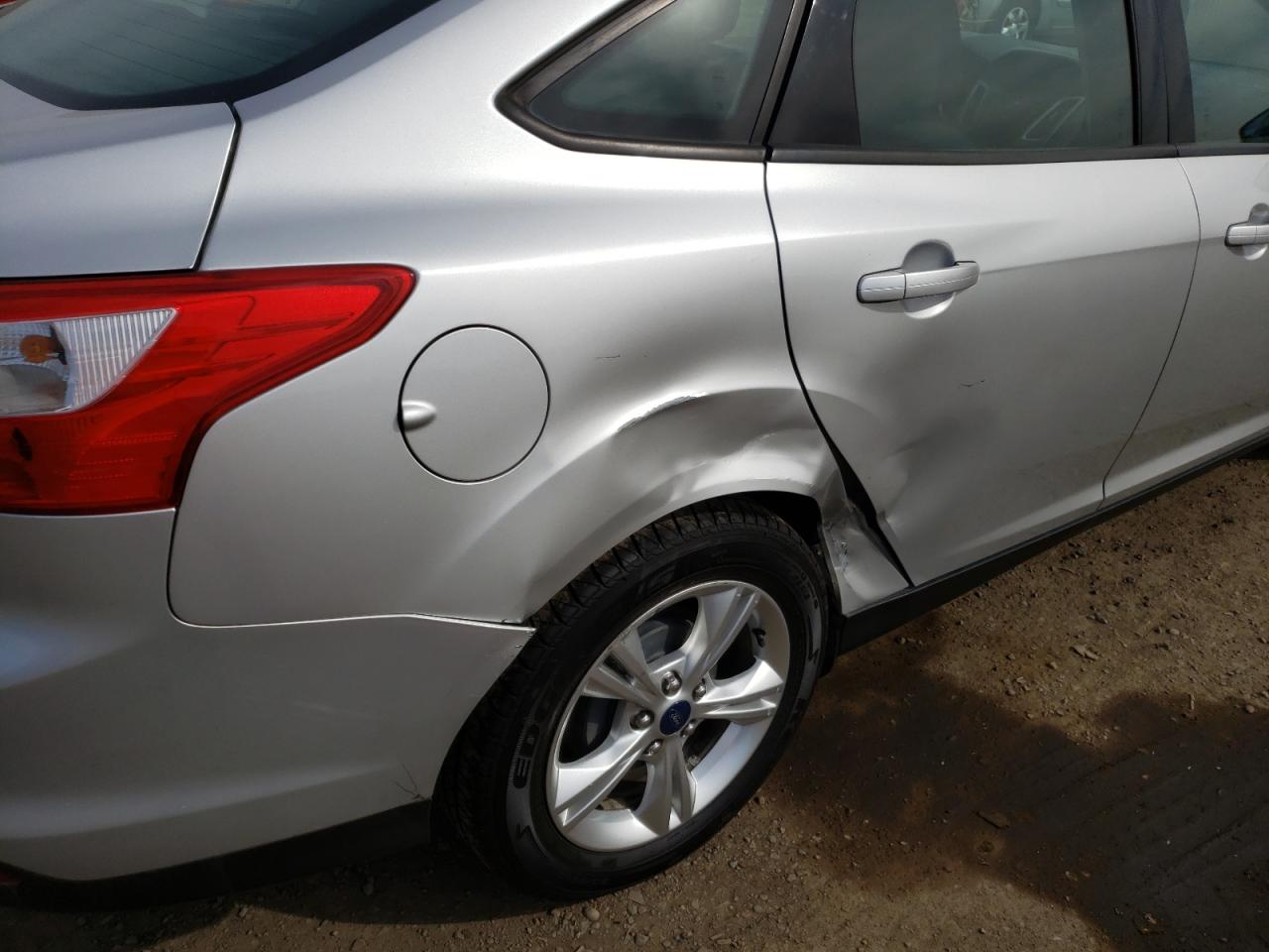 Photo 9 from auction – 2013 FORD FOCUS SE with VIN 1FADP3F29DL301853