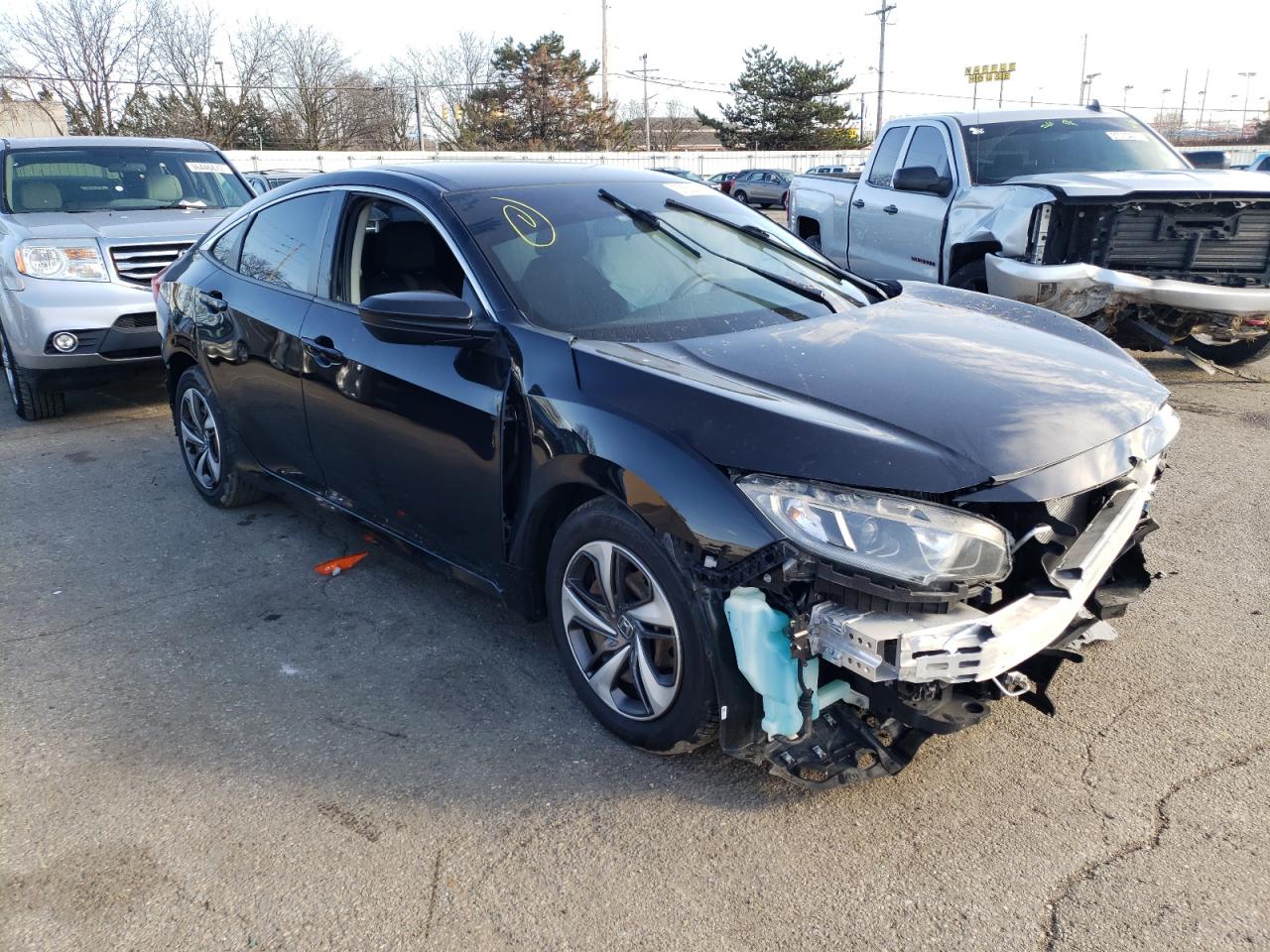 HONDA CIVIC LX 2019 with VIN 19XFC2F62KE011083 - Photo from auction