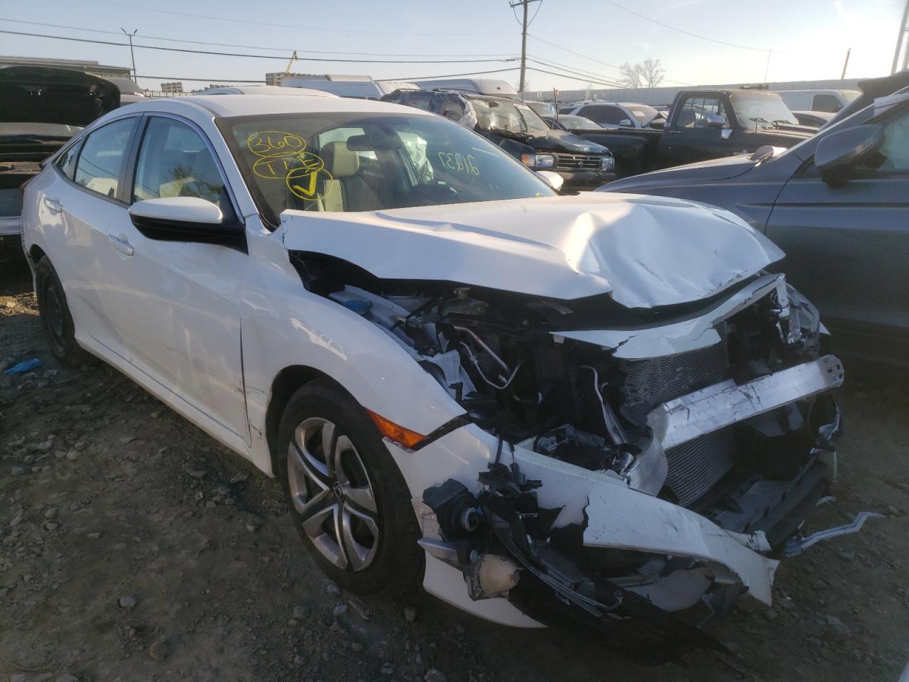 Photo 1 from auction – 2017 HONDA CIVIC LX with VIN 19XFC2F55HE224836
