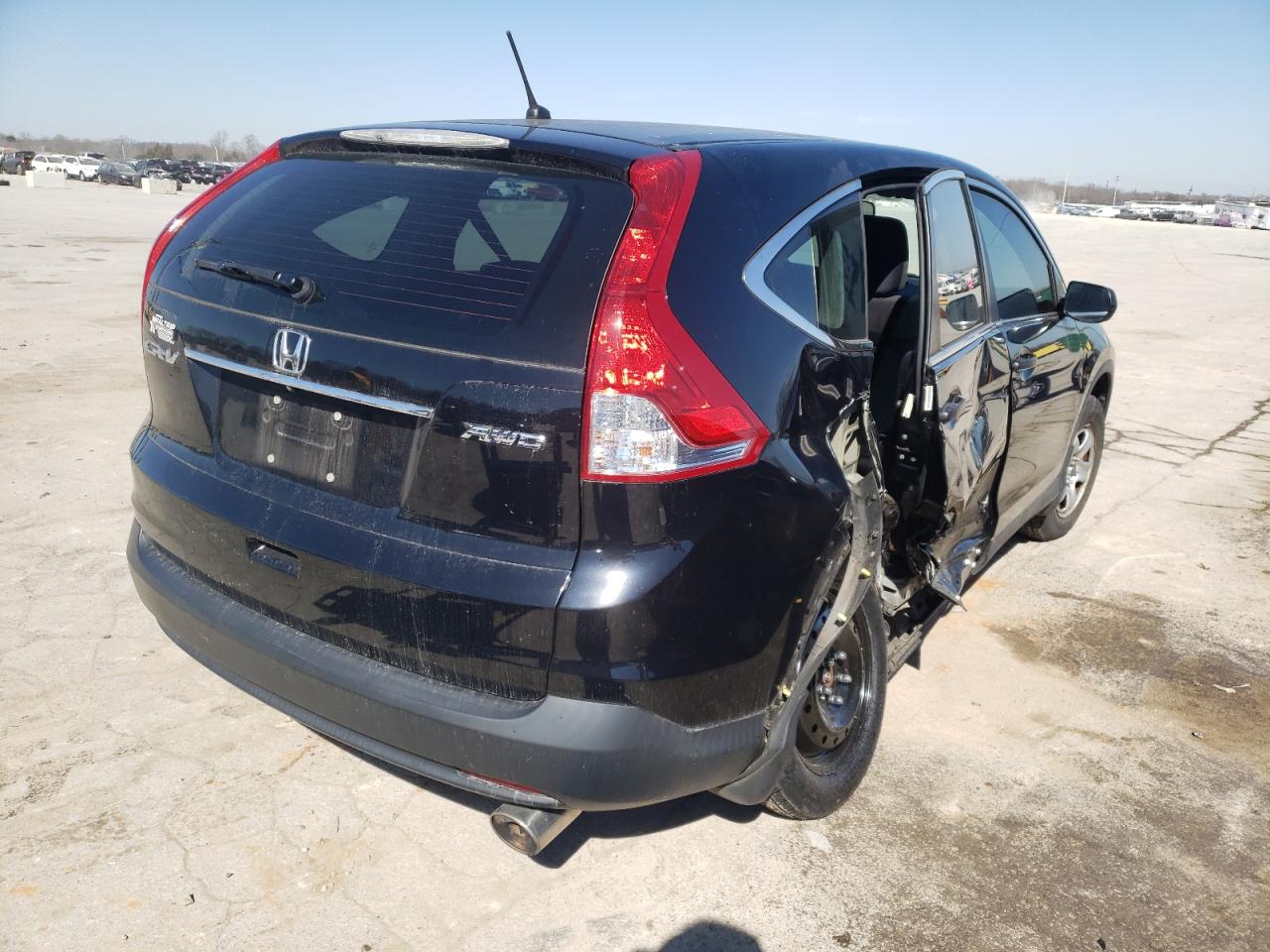 Photo 4 from auction – 2014 HONDA CR-V LX with VIN 2HKRM4H33EH653627