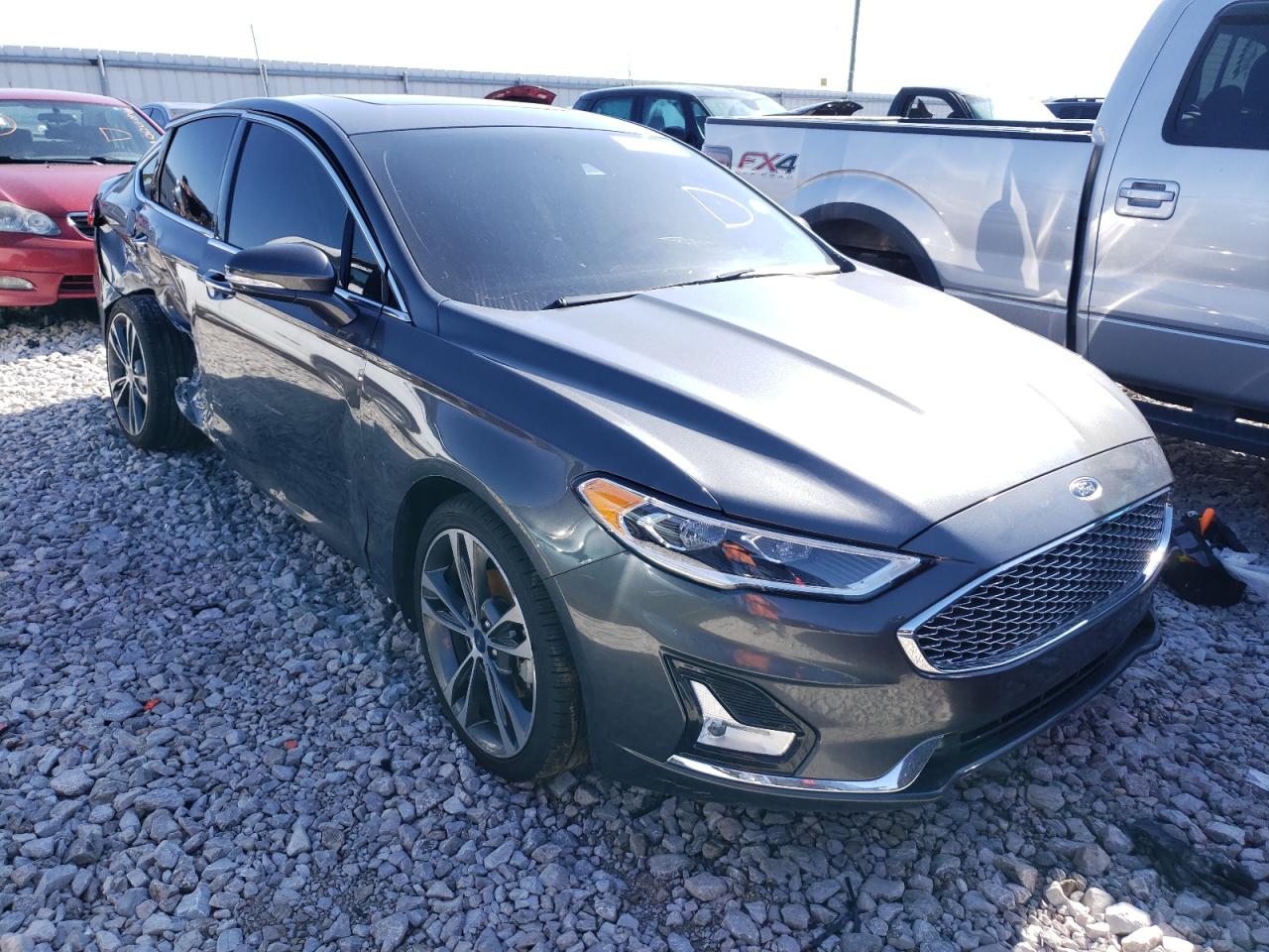 FORD FUSION TIT 2020 with VIN 3FA6P0D9XLR133230 - Photo from auction