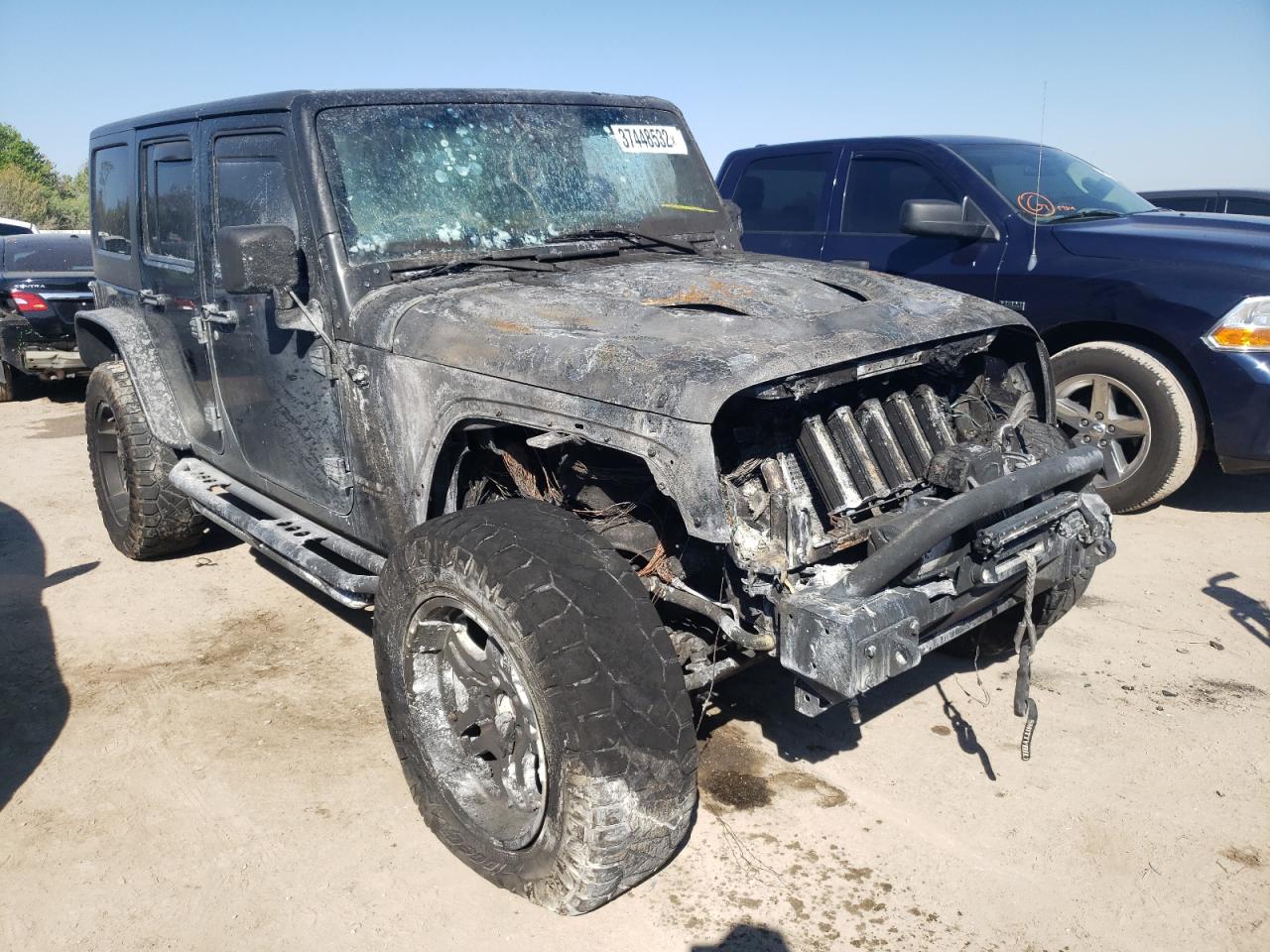 Photo 1 from auction – 2014 JEEP WRANGLER U with VIN 1C4BJWFG9EL138784