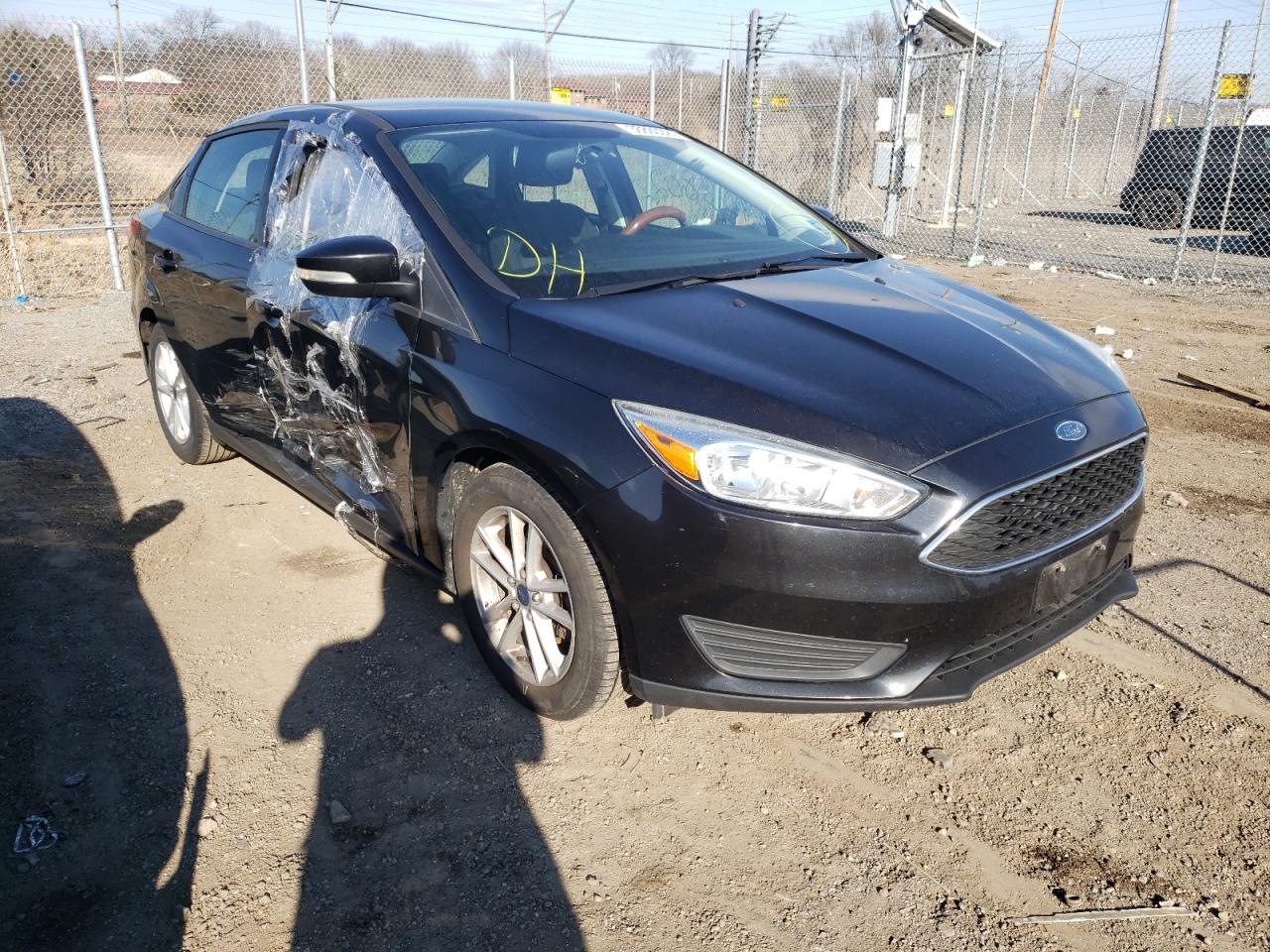 FORD FOCUS SE 2015 with VIN 1FADP3F22FL325933 - Photo from auction