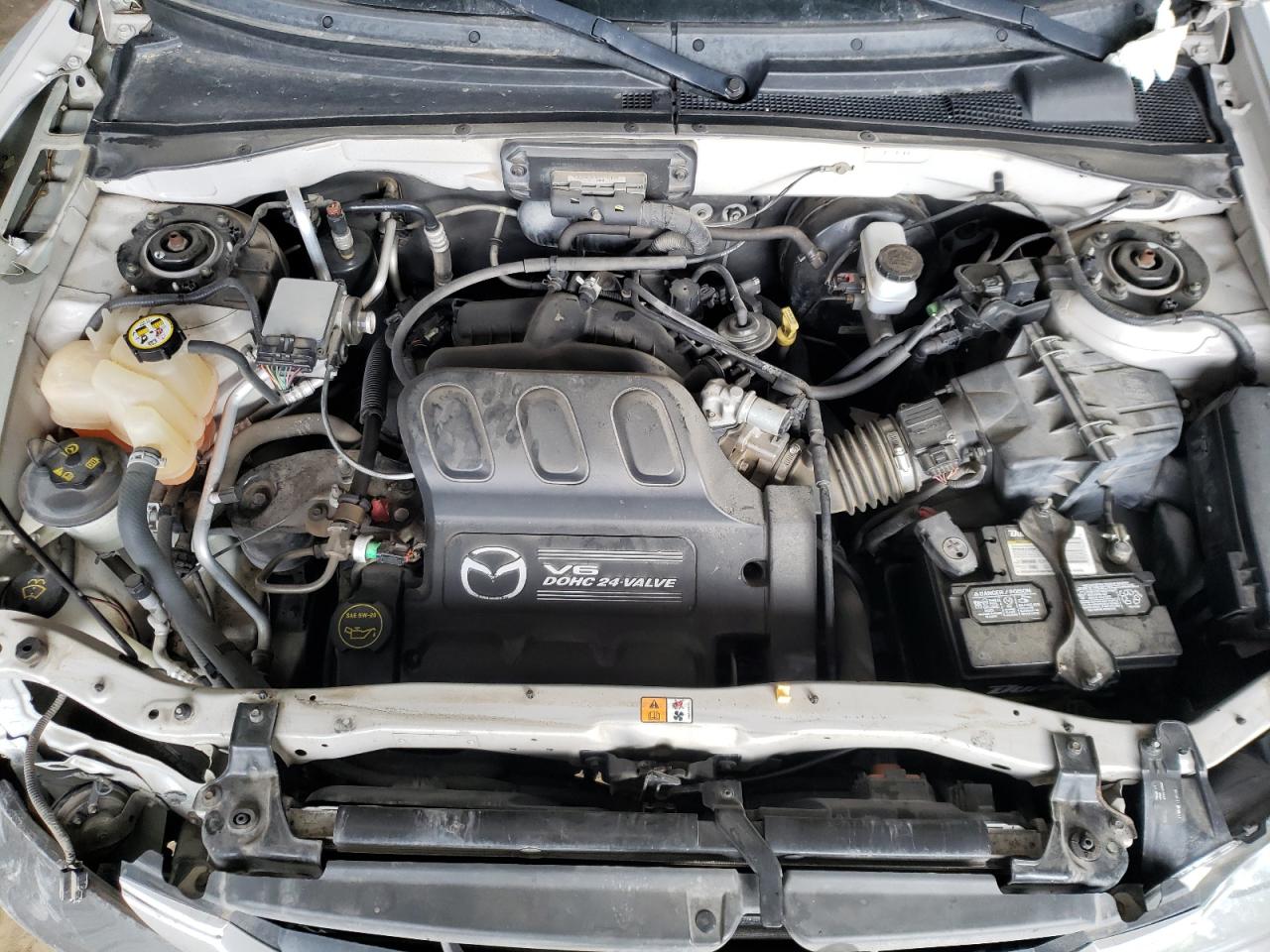 Photo 7 from auction – 2003 MAZDA TRIBUTE LX with VIN 4F2YZ94133KM21204